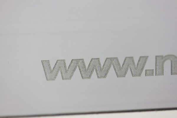 Detail of engraving on light gray Smart Cover