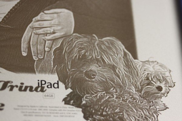 Photo of dogs laser engraved on to iPad