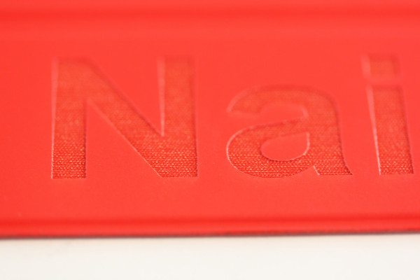 Details: Engraving of Red Polyurethane Smart Cover