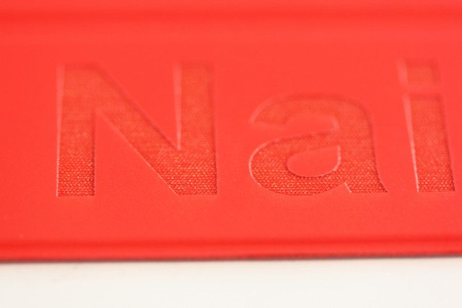 Details: Engraving of Red Polyurethane Smart Cover